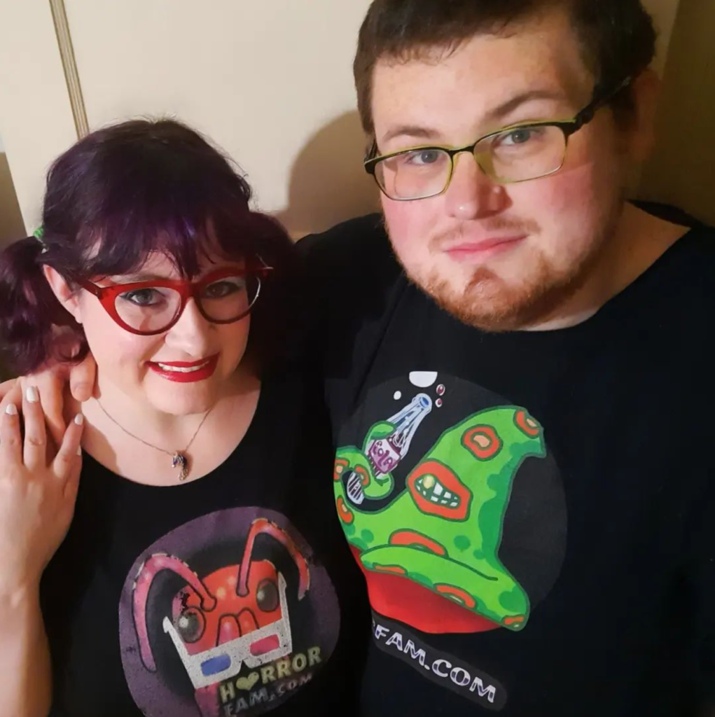 Lauren Spear and Frank Spear wearing HorrorFam.com t-shirts